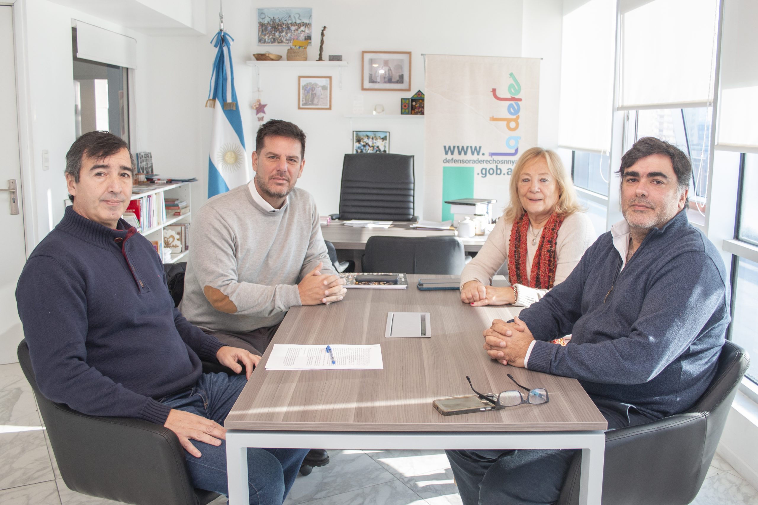 La Defensoria junto al Presidente de Lotería PBA.